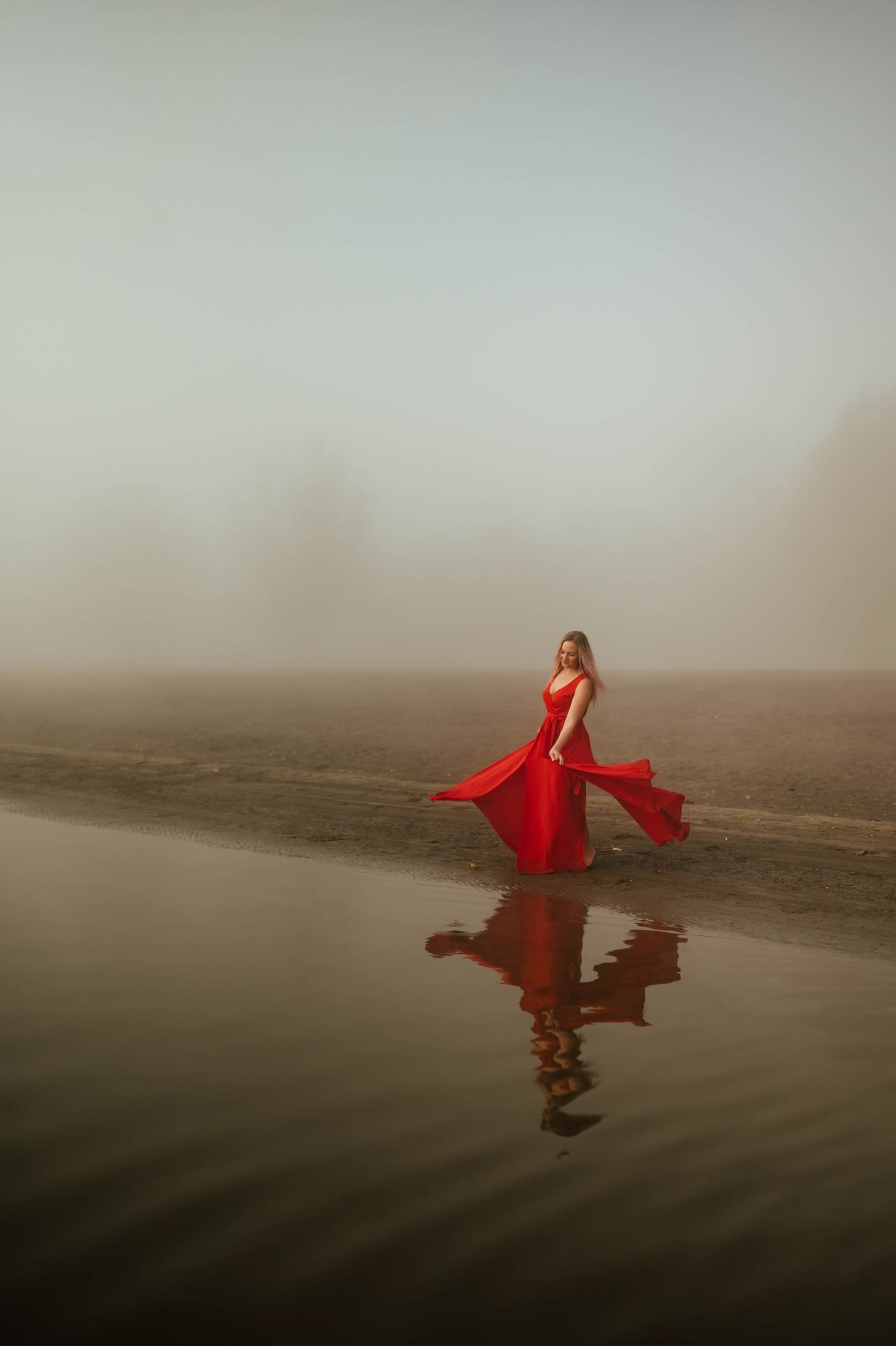 red dress woman by river