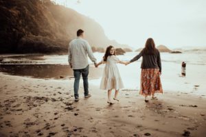 Family of three at Oregon beach