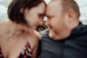 Blurred image of couple nuzzling