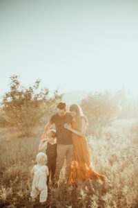 Family together in a field