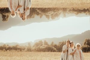 double exposure of a grandma, mom and daughter In a field